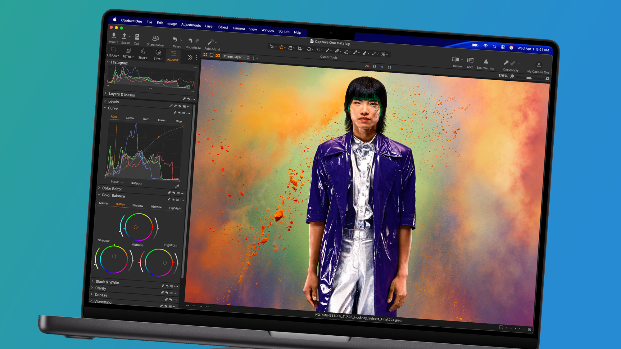 Apple MacBook Pro M5 Pro on a green and blue background