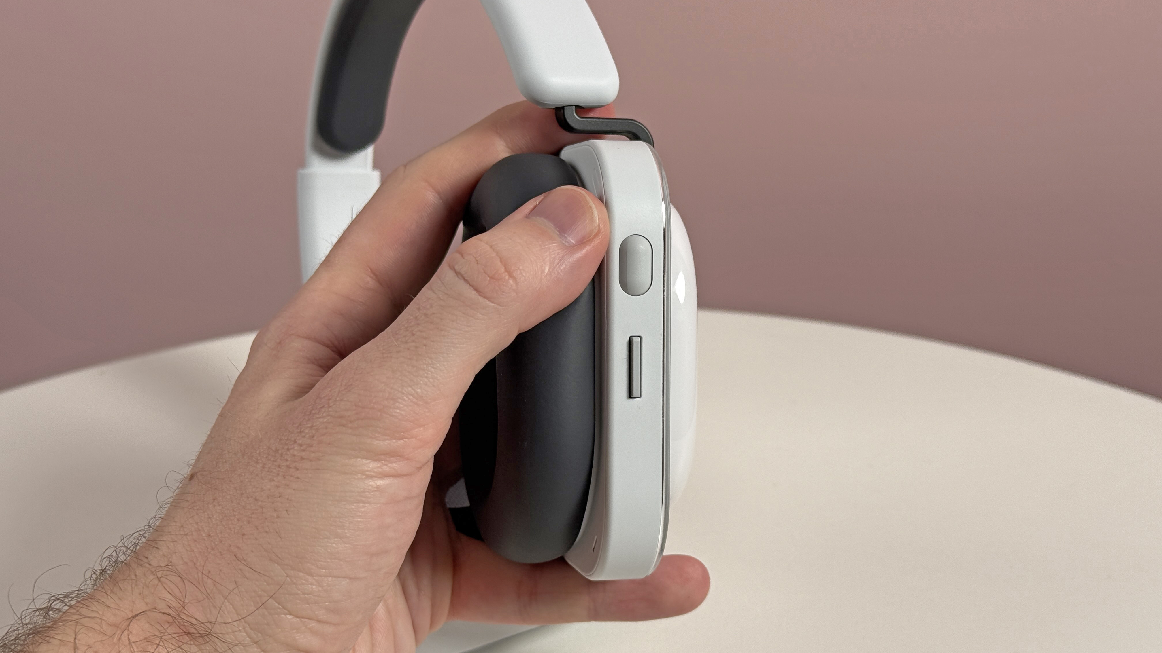 Nothing Headphone (a) scroll and rocker buttons on the side