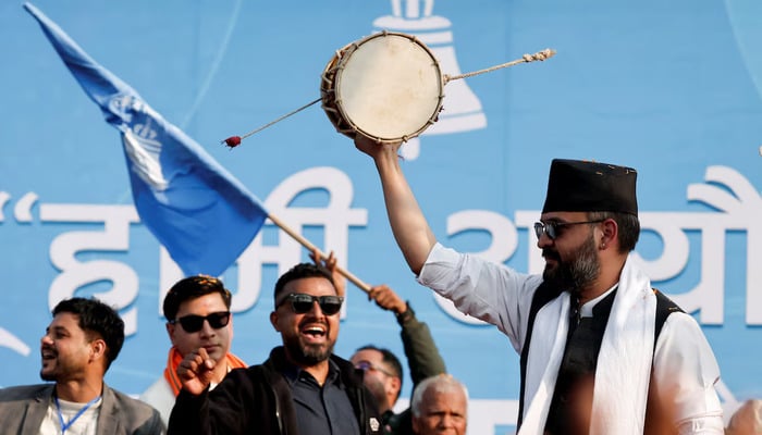 Balendra Shah, former mayor of Kathmandu popularly known as Balen, who party officials say will become prime minister under an internal deal if the Rastriya Swatantra Party (RSP) wins the March 5 election, plays a damru percussion instrument during an election campaign in Janakpur, Nepal on January 19, 2026. — Reuters
