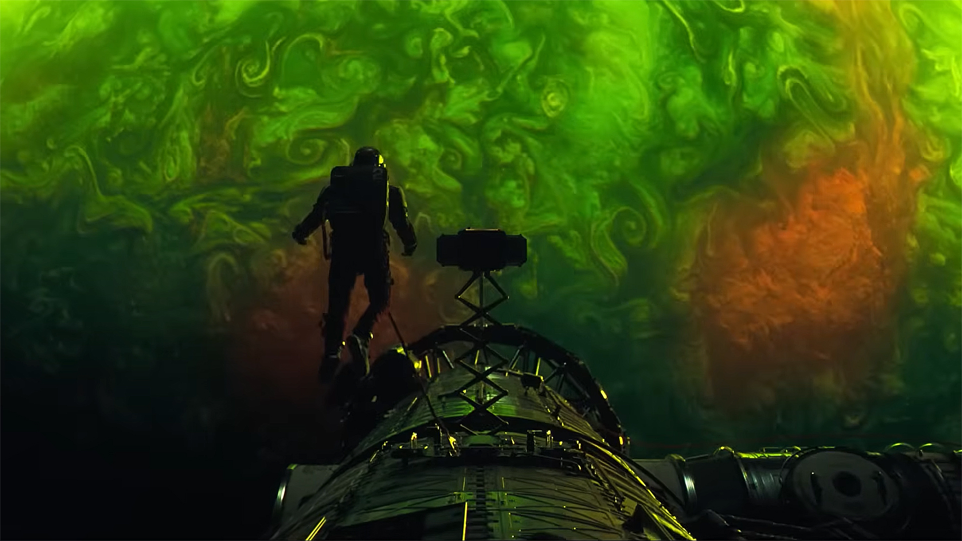 Ryland Grace looks at an alien planet while on a spacewalk in Project Hail Mary