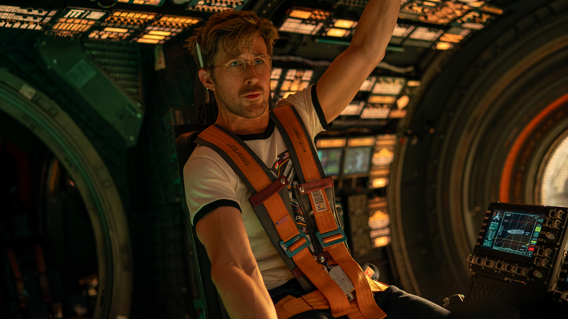 Ryland Grace sits in the cockpit of his spaceship in Project Hail Mary