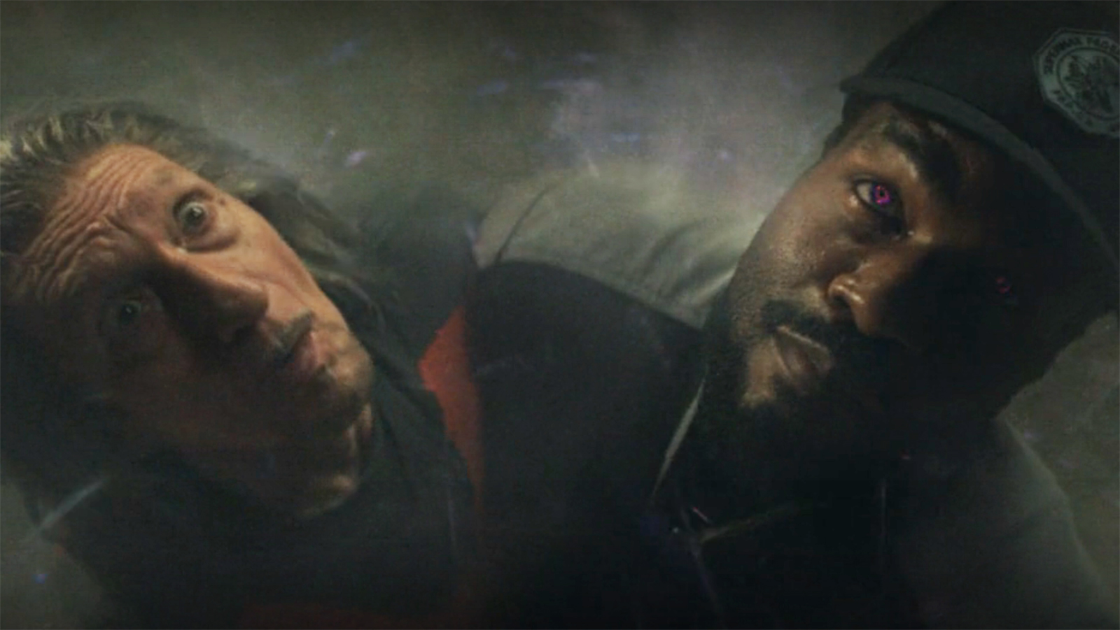 Trevor and Simon look up as debris falls around them in Wonder Man episode 8