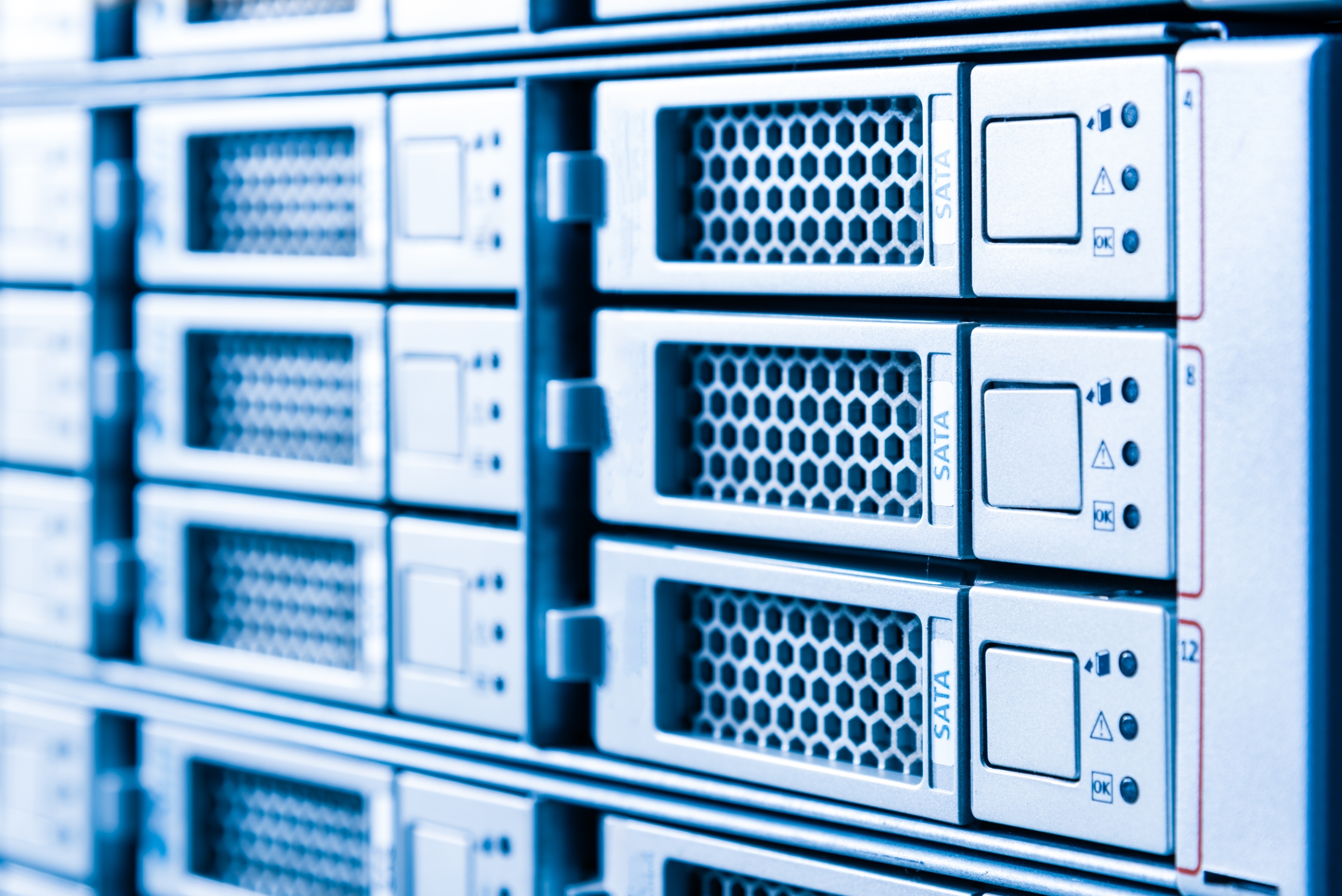 Row of hard drives that serve as data storage in the server room