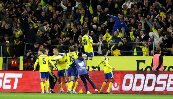 Sweden's players celebrate after their third goal during the UEFA qualifying match against Poland at Strawberry Arena, Solna, Sweden on March 31, 2026. — Reuters