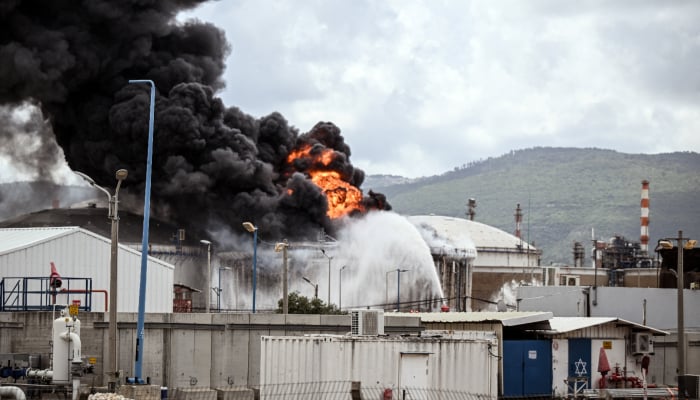 A fire after the Israel Fire and Rescue Service said an industrial building and a fuel tanker at Israel's oil refineries were hit by debris from an intercepted Iranian missile amid the US-Israel conflict with Iran in Haifa, Israel March 30, 2026. — Reuters