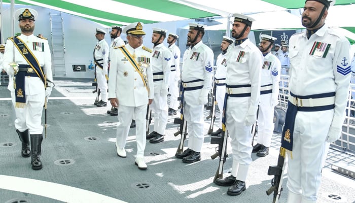 Chief of Naval Staff Admiral Naveed Ashraf walks the watch during the commissioning ceremony of PNS Khaibar in this photo released on April 4, 2026. — ISPR
