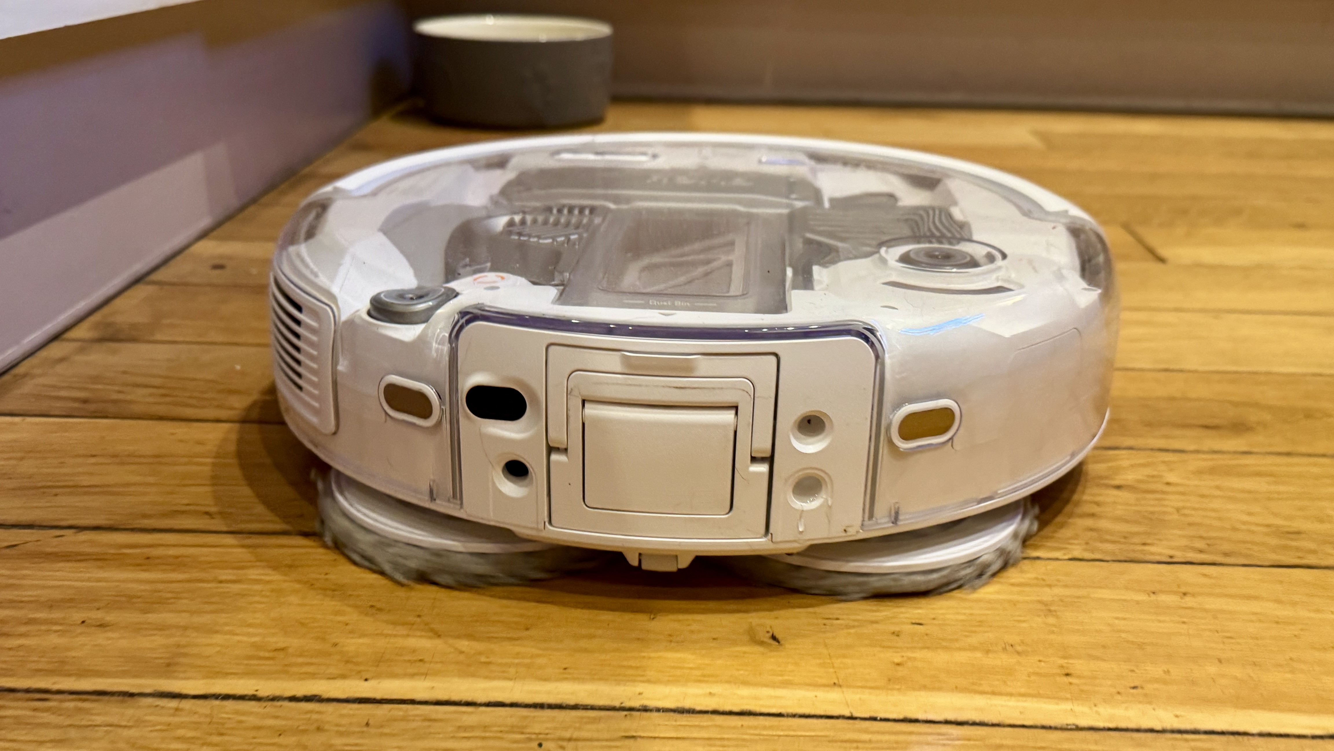 DJI Romo P robot vacuum cleaner that cleans a hard floor