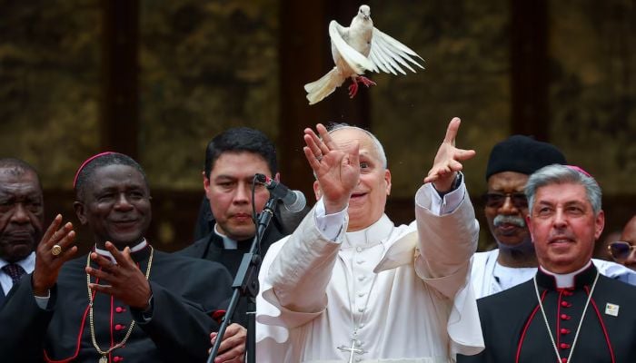 Pope Leo XIV releases a bird next to Archbishop of Bamenda Andrew Fuanya Nkea and other officials after a meeting for peace with the Bamenda community at Saint Josephs Cathedral in Bamenda, Cameroon, April 16, 2026. — Reuters