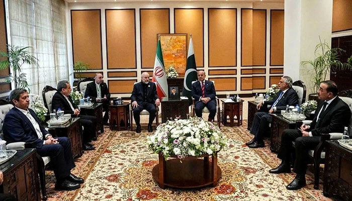 Prime Minister Shehbaz Sharif meets with Iranian Parliament Speaker Mohammad Bagher Ghalibaf, as delegations from the United States and Iran are expected to hold peace talks, in Islamabad on April 11, 2026. — Reuters