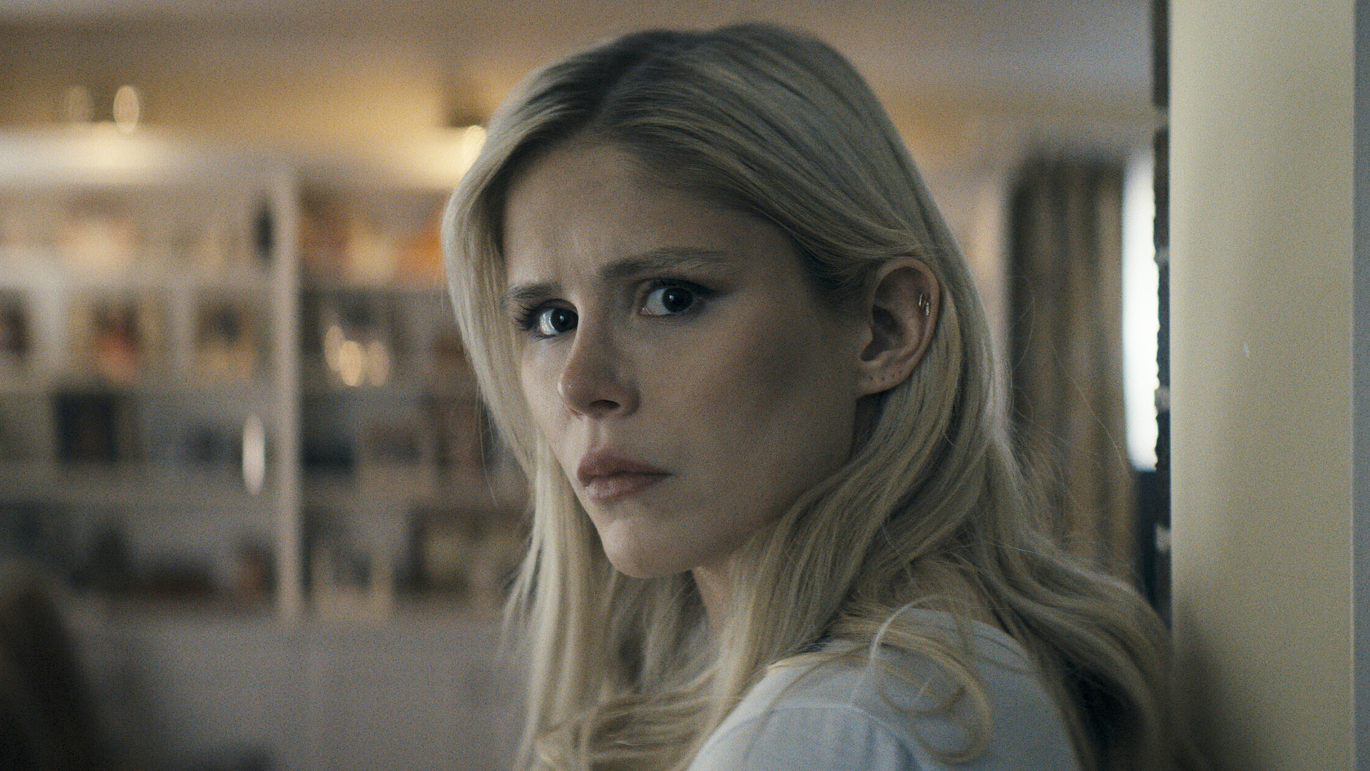 Starlight looks directly into the camera over her left shoulder in The Boys Season 5 Episode 4