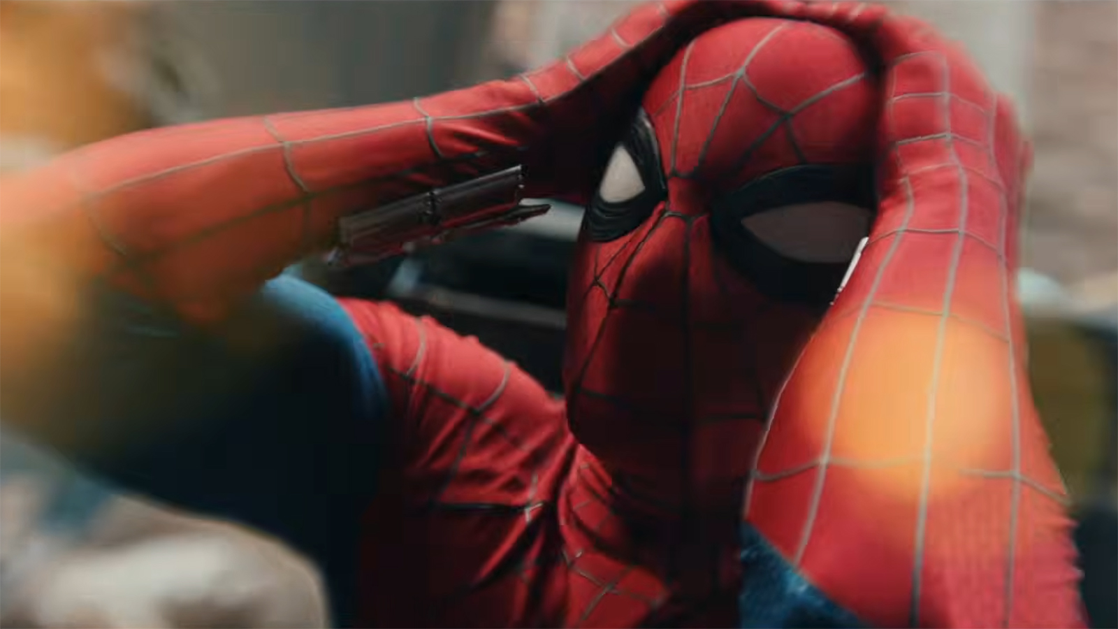 Spider-Man holds his head in pain in Spider-Man: Brand New Day
