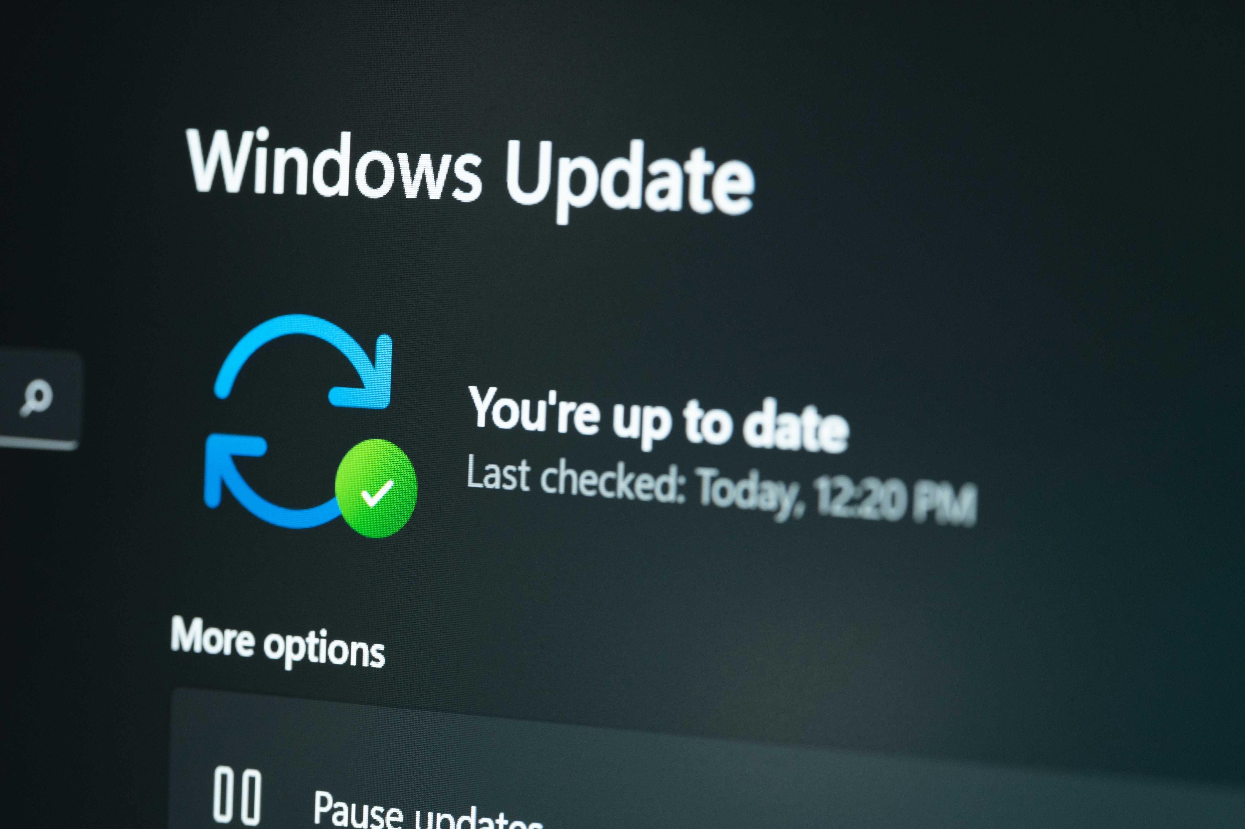 Checking windows update on laptop screen close-up