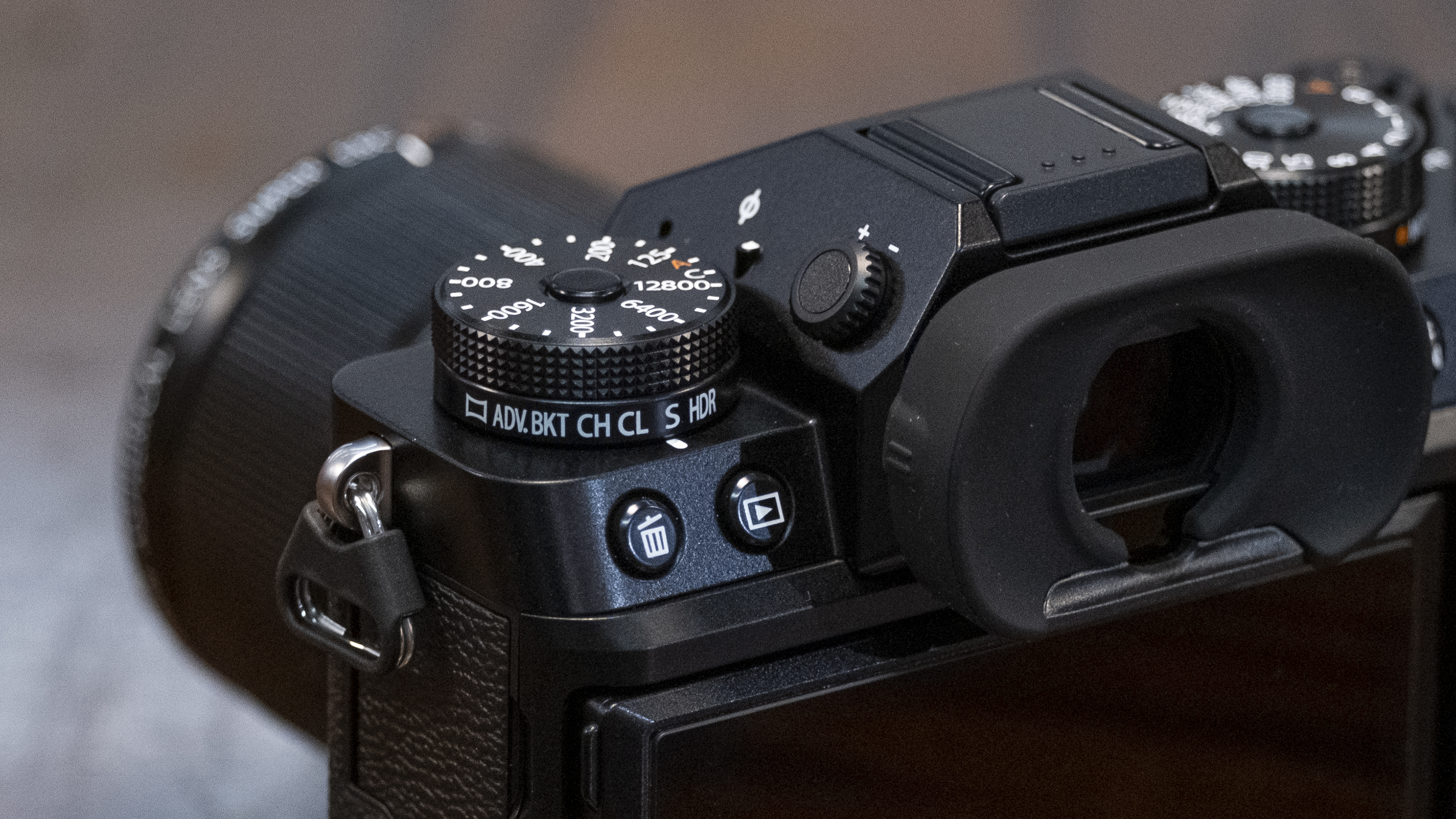 The Fujifilm X-T5 camera sits on a table