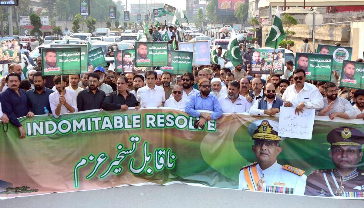 Traders hold a rally to celebrate one year anniversary of Marka-e-Haq on Mall Road. - Online