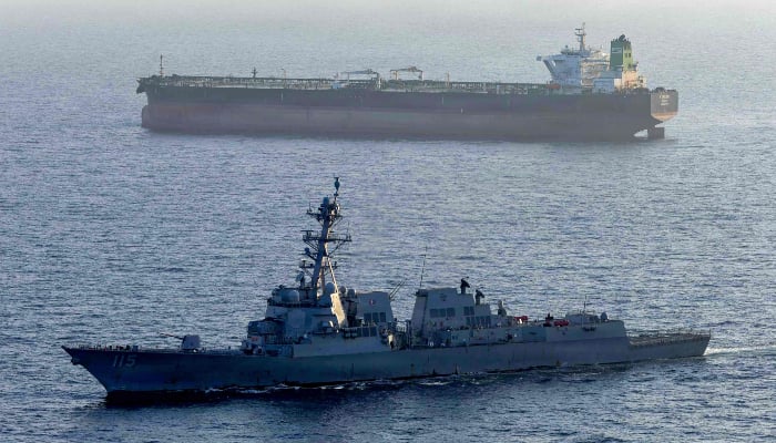 This US Navy handout photo, released May 7, 2026 by US Central Command Public Affairs, shows the Arleigh Burke-class guided-missile destroyer USS Rafael Peralta (DDG 115) implementing a maritime blockade against the Iran-flagged crude oil tanker Stream as the latter attempted to sail towards an Iranian port, April 20, AFP.