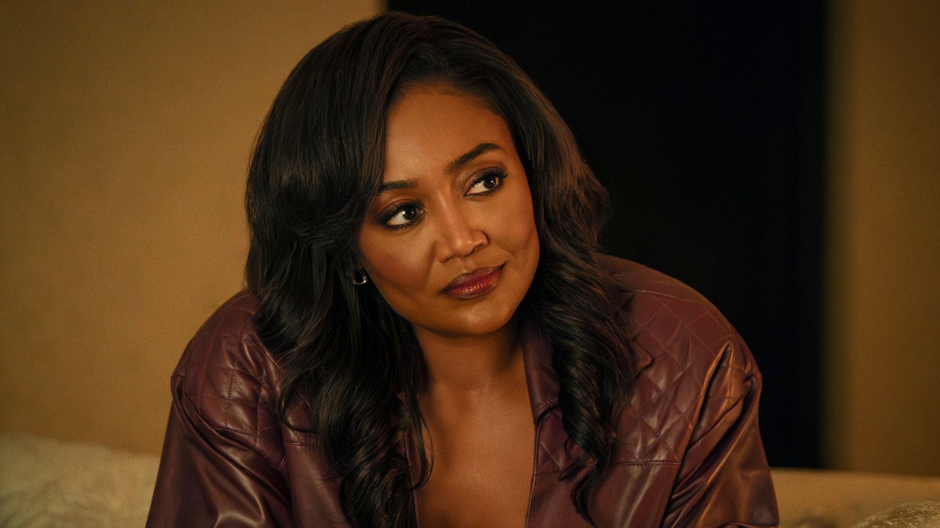 Raq looks at something off screen