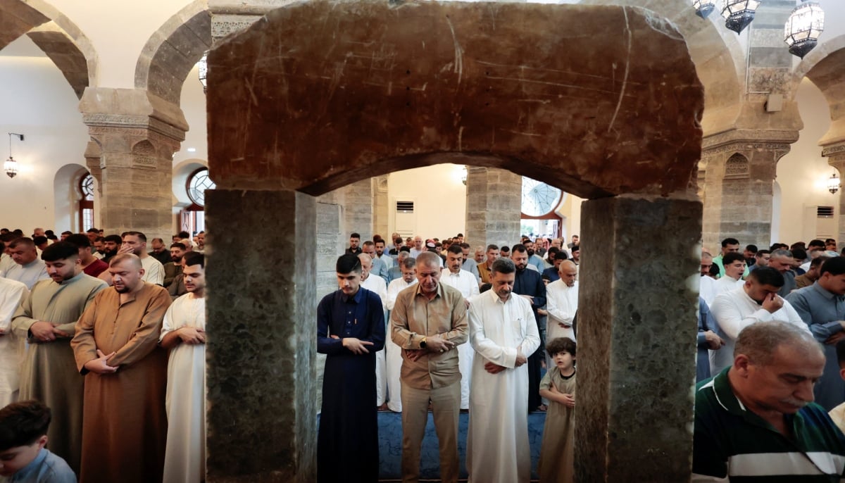 Muslim worshipers participate in Eid ul Adha prayers in Mosul, Iraq, May 27, 2026. — Reuters