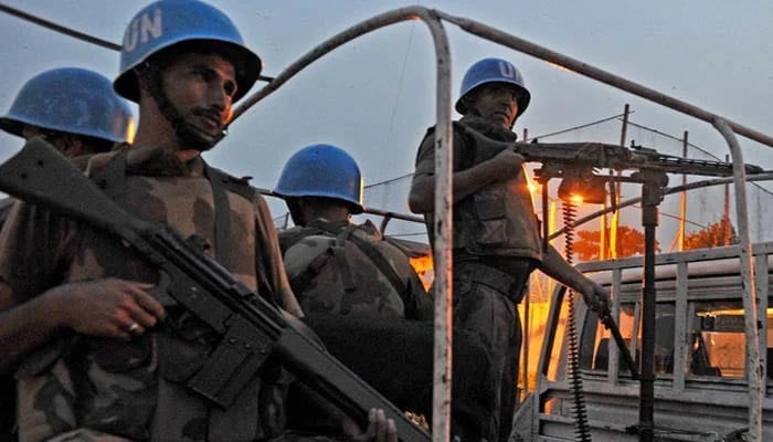 Pakistani UN peacekeepers patrol near the UN Force in Ivory Coast (ONUCI) headquarters in Abidjan. — AFP/file
