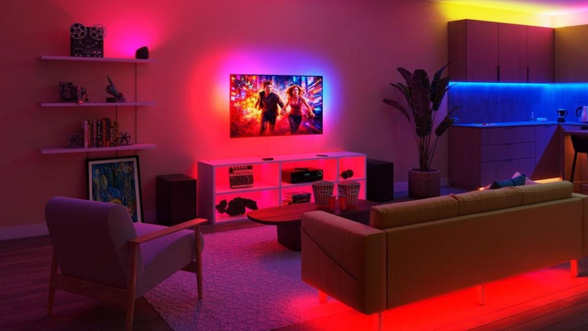 A room illuminated in several colors from various Philips Smart Lighting products, where the TV light strip reflects the colors on the screen
