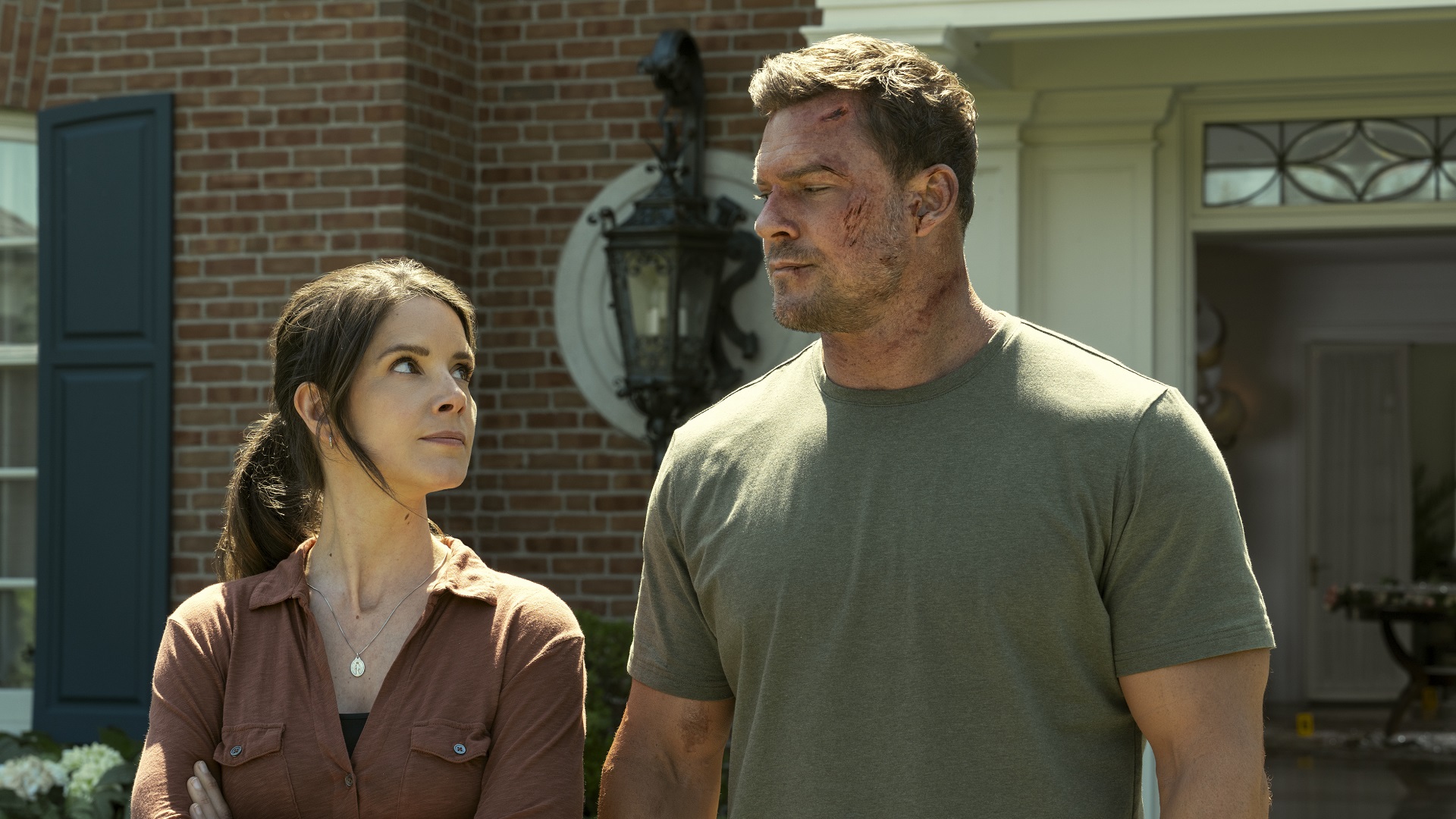 Reacher looks at another character in the TV show