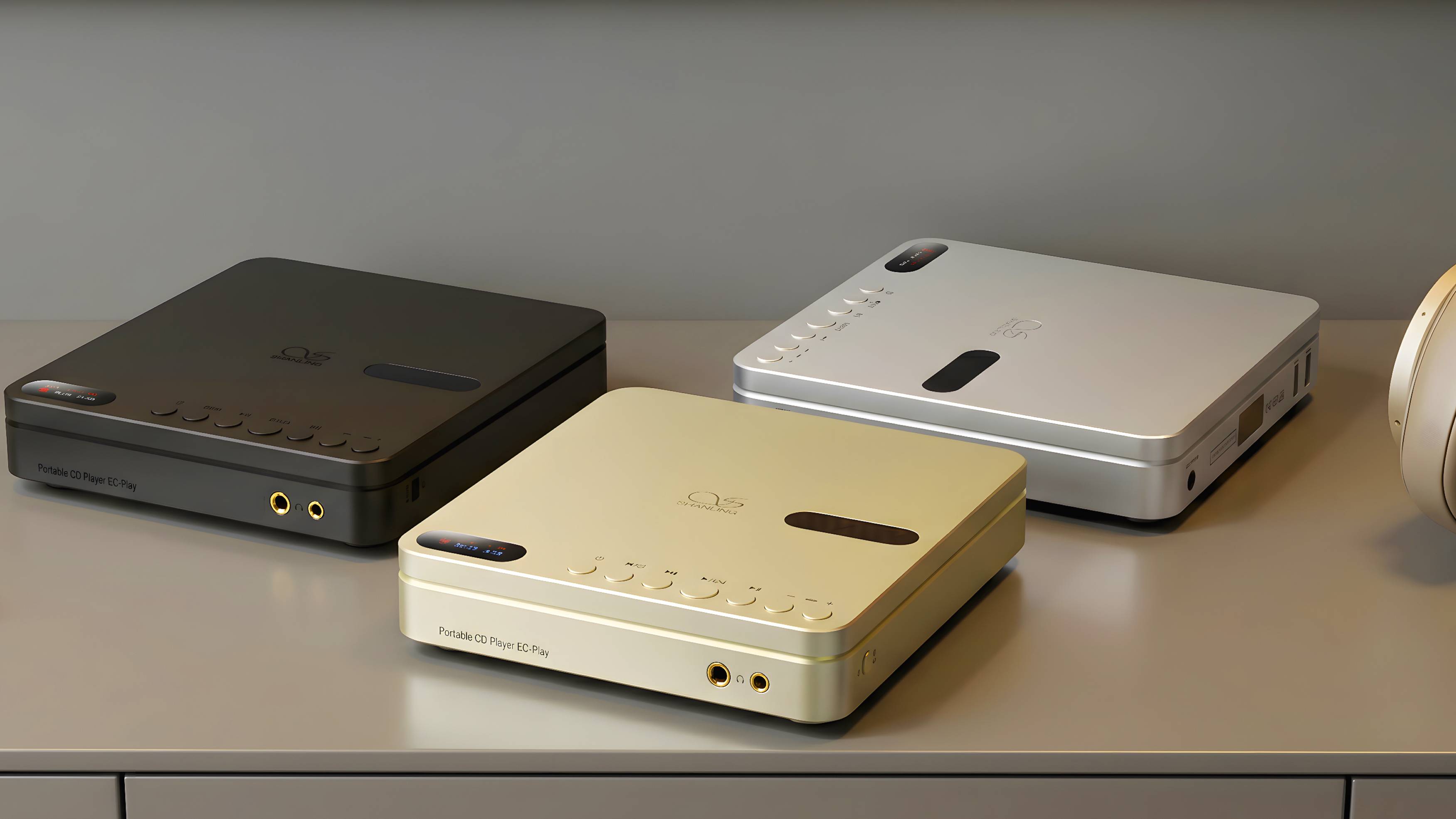 Three different color models of Shanling EC Play on one shelf.