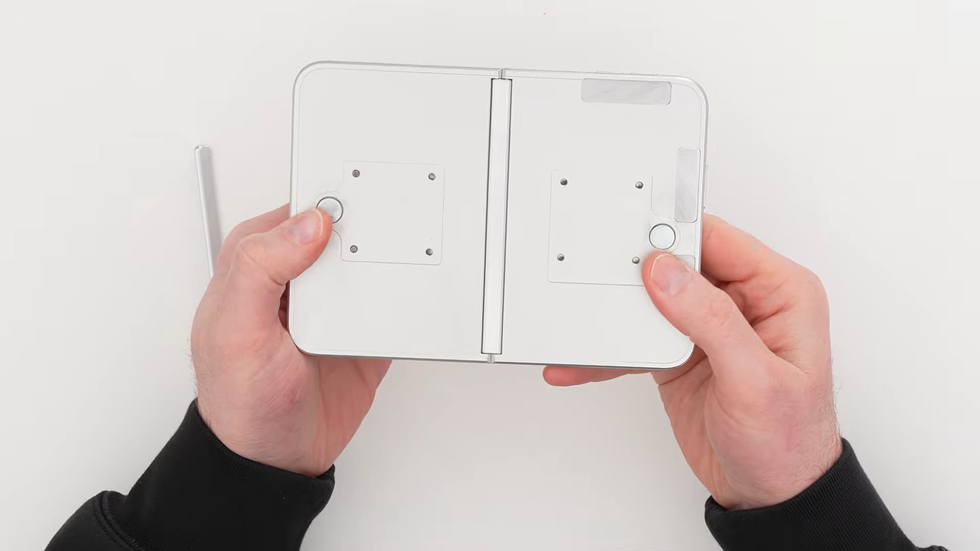 Unbox Therapy examines a dummy unit of Apple's foldable iPhone Ultra.
