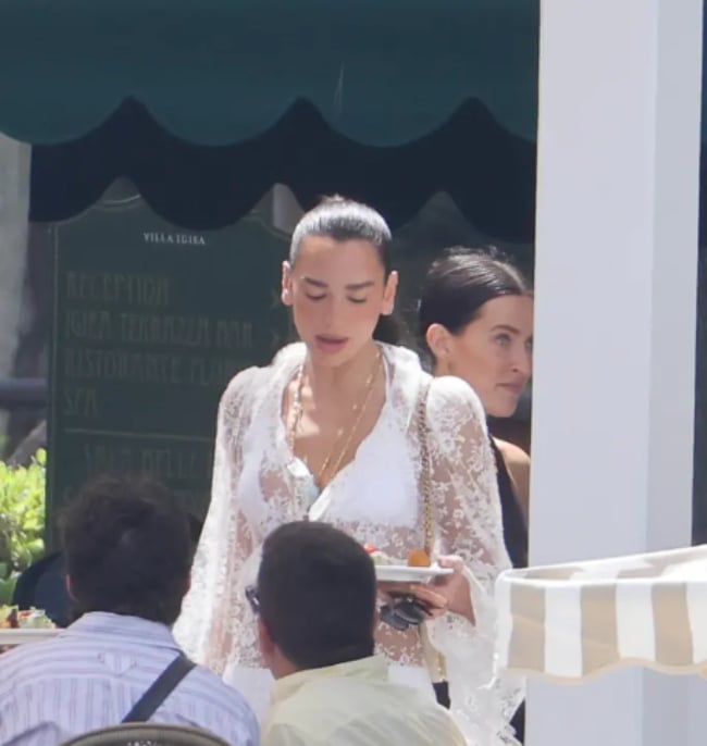 Dua Lipa surprises at post-wedding gathering in Italy