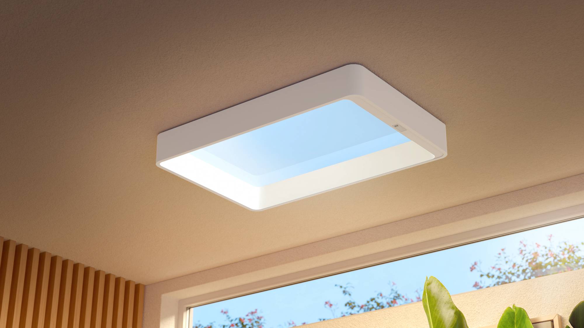 Philips Ceiling light attached to a ceiling in the home, imitating a blue sky