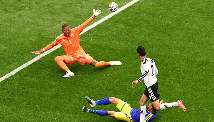 Germany's Kai Havertz scores the seventh goal past Curacao's Eloy Room, Houston Stadium, Houston, Texas, United States, June 14, 2026. — Reuters