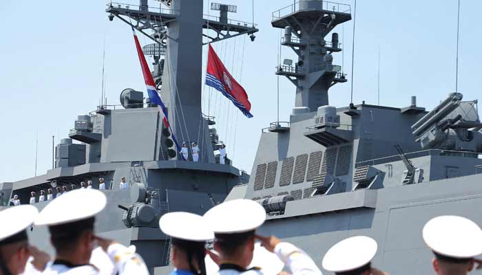 Sailors salute during the commissioning ceremony of the new multi-purpose destroyer Choe Hyon in Nampho port, North Korea, June 23, 2026, in this photo released by North Korea's official Korean Central News Agency.— Reuters