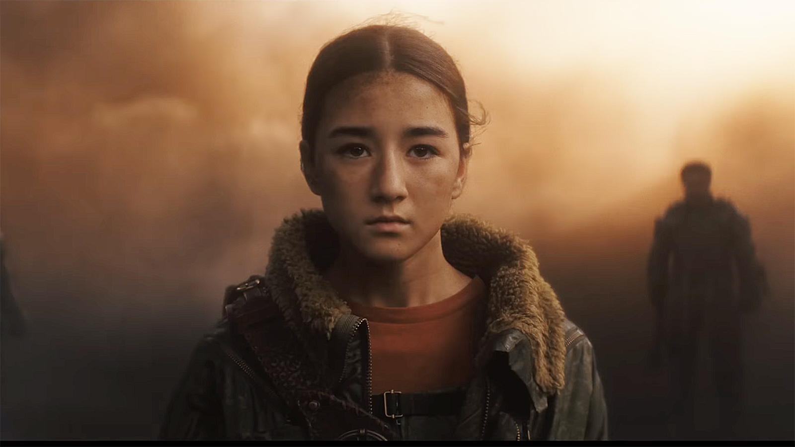 Ruthye stands in a dusty spot in Supergirl