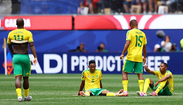 South Africa's Thalente Mbatha and teammate look dejected after the match as South Africa are eliminated from the World Cup. — Reuters/File