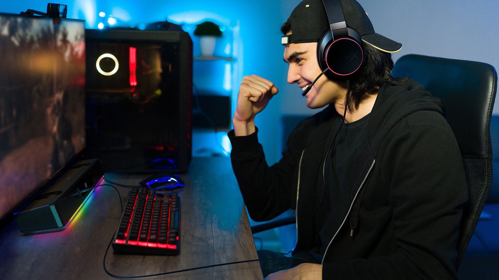 Lifestyle shot of gamer using Creative Sound Blaster Katana V2X