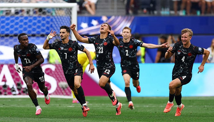 Canada's Stephen Eustaquio celebrates their first goal with teammates. — Reuters/File