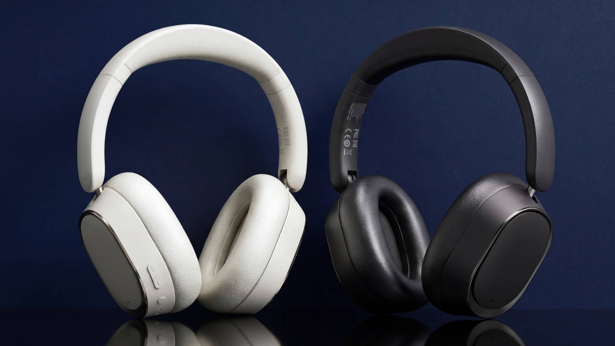 Two models of the FiiO EH13 on a navy blue background.
