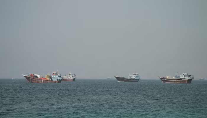 Vessels in the Strait of Hormuz, as seen from Musandam, Oman, June 25, 2026.— Reuters/File