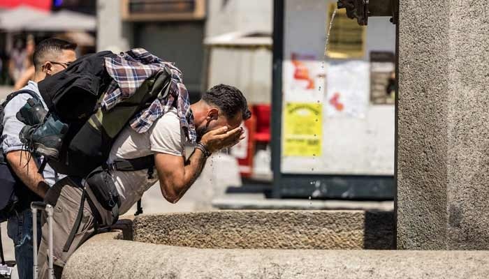 A man refreshes himself during a heat wave in Chamonix, France, June 25, 2026. — Reuters