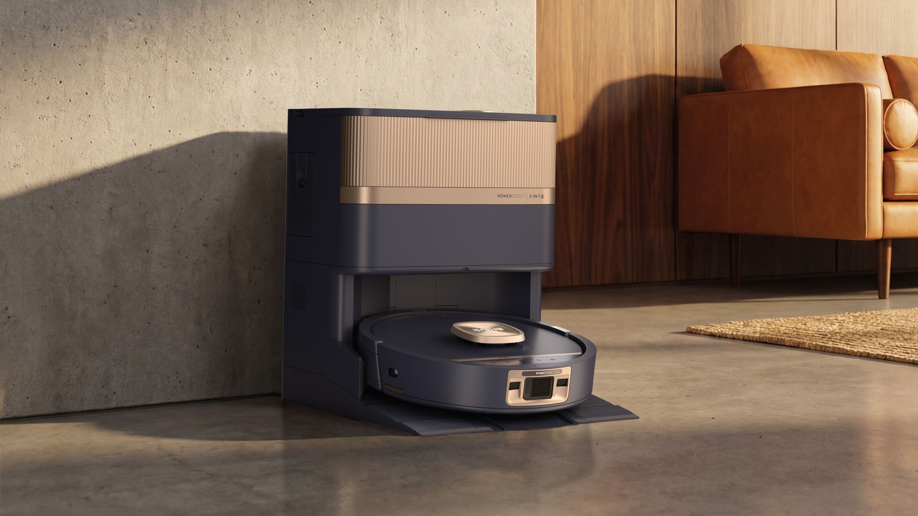 Shark PowerDetect UV Reveal 2-in-1 Vac & Mop in blue and copper, in dock in the living room