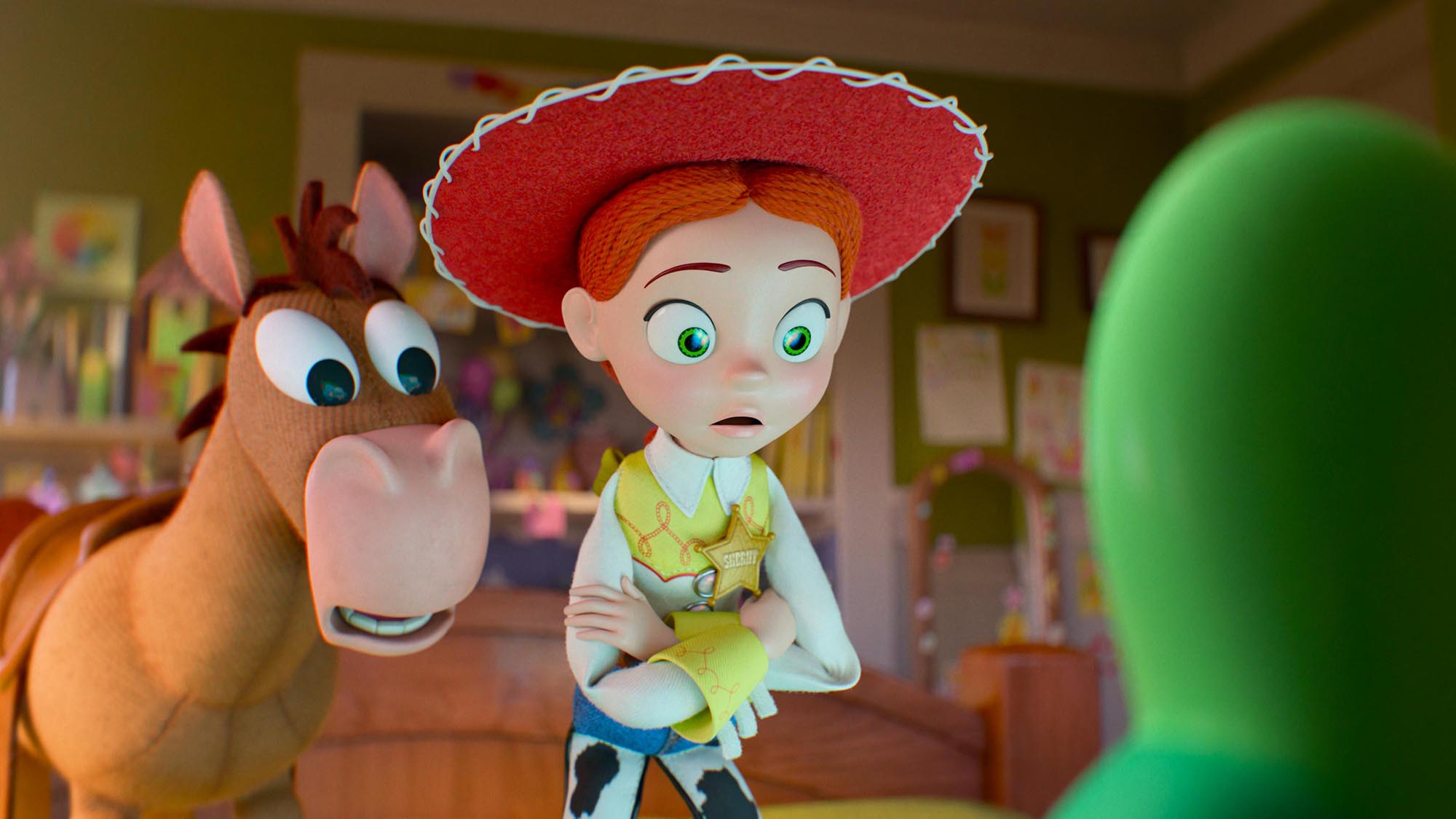Bullseye and Jessie stare at Lilypad's screen in Toy Story 5