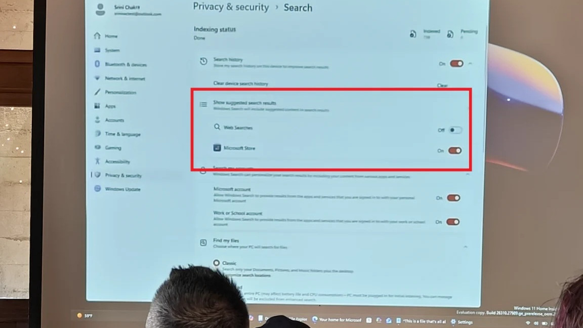 Windows 11 option to disable web search results in Settings, shown in a meeting on a projector screen