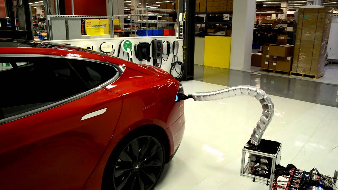 Charger prototype makes its way to Model S - YouTube