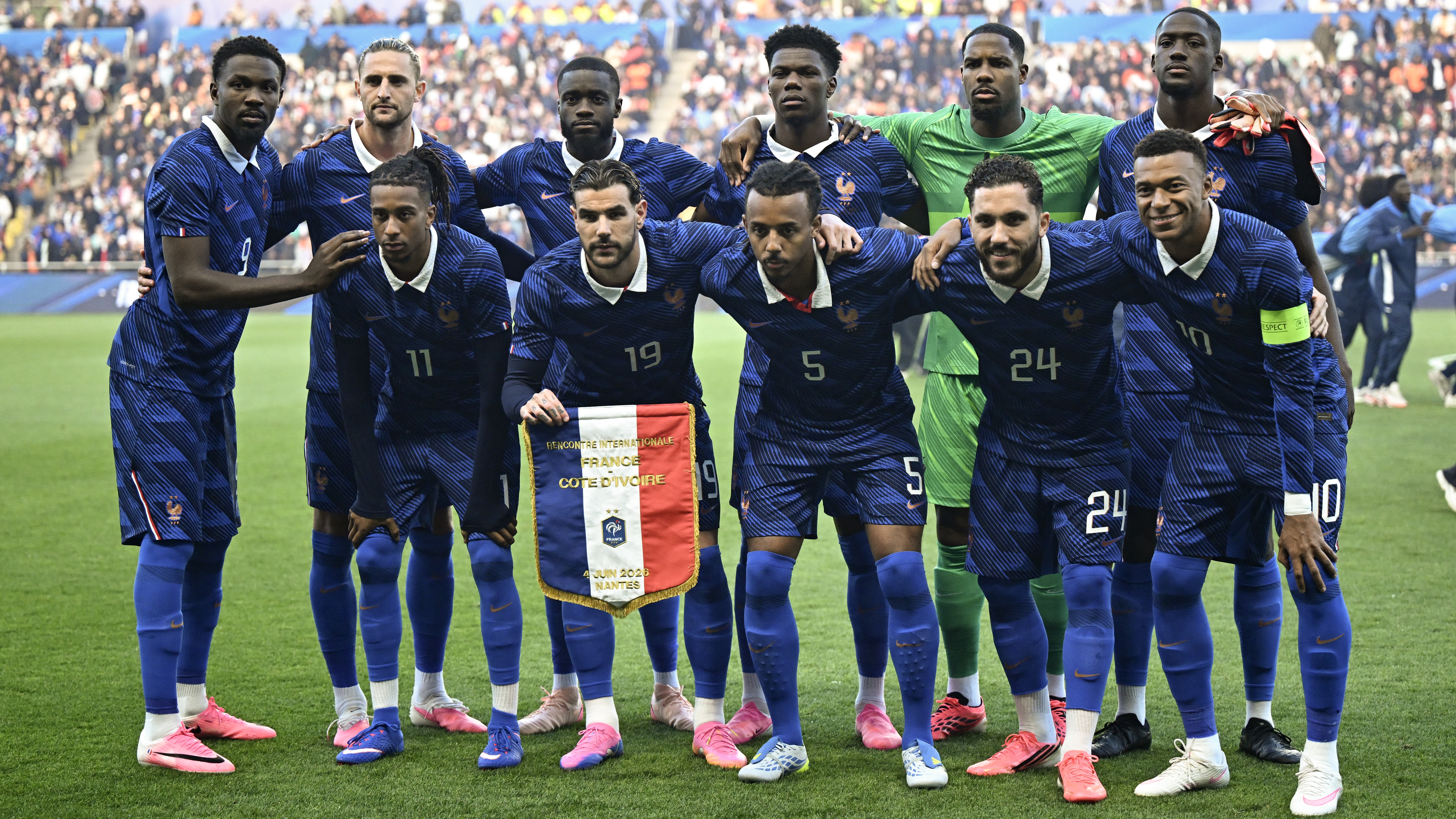 France players pose for a team photograph before the international friendly football match between France and Ivory Coast at the Stade de la Beaujoire in Nantes