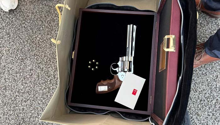 A gun given by Turkish President Recep Tayyip Erdogan to Belgian Prime Minister Bart De Wever at the NATO summit in Ankara. - Reuters