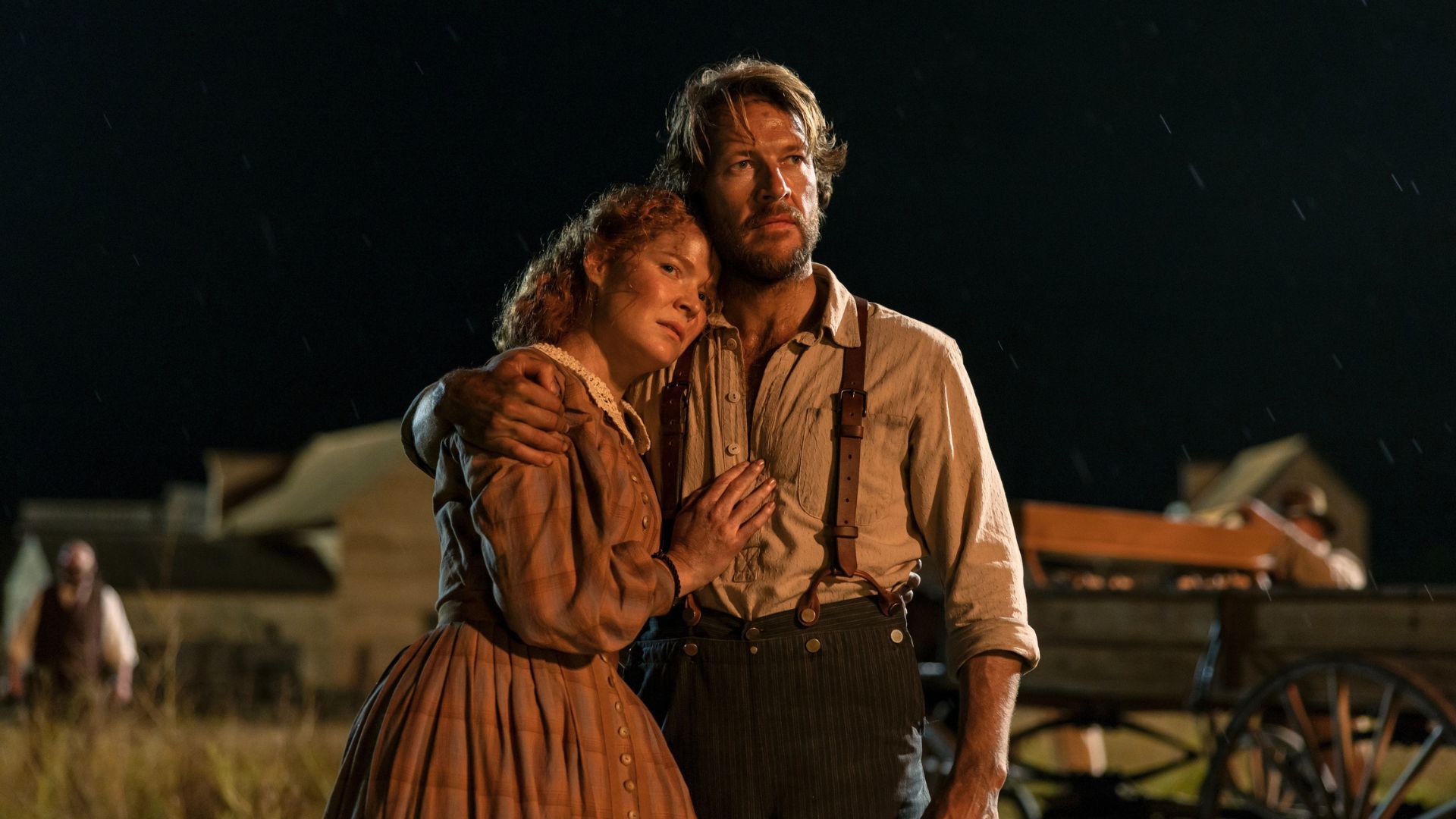 Caroline and Charles embrace