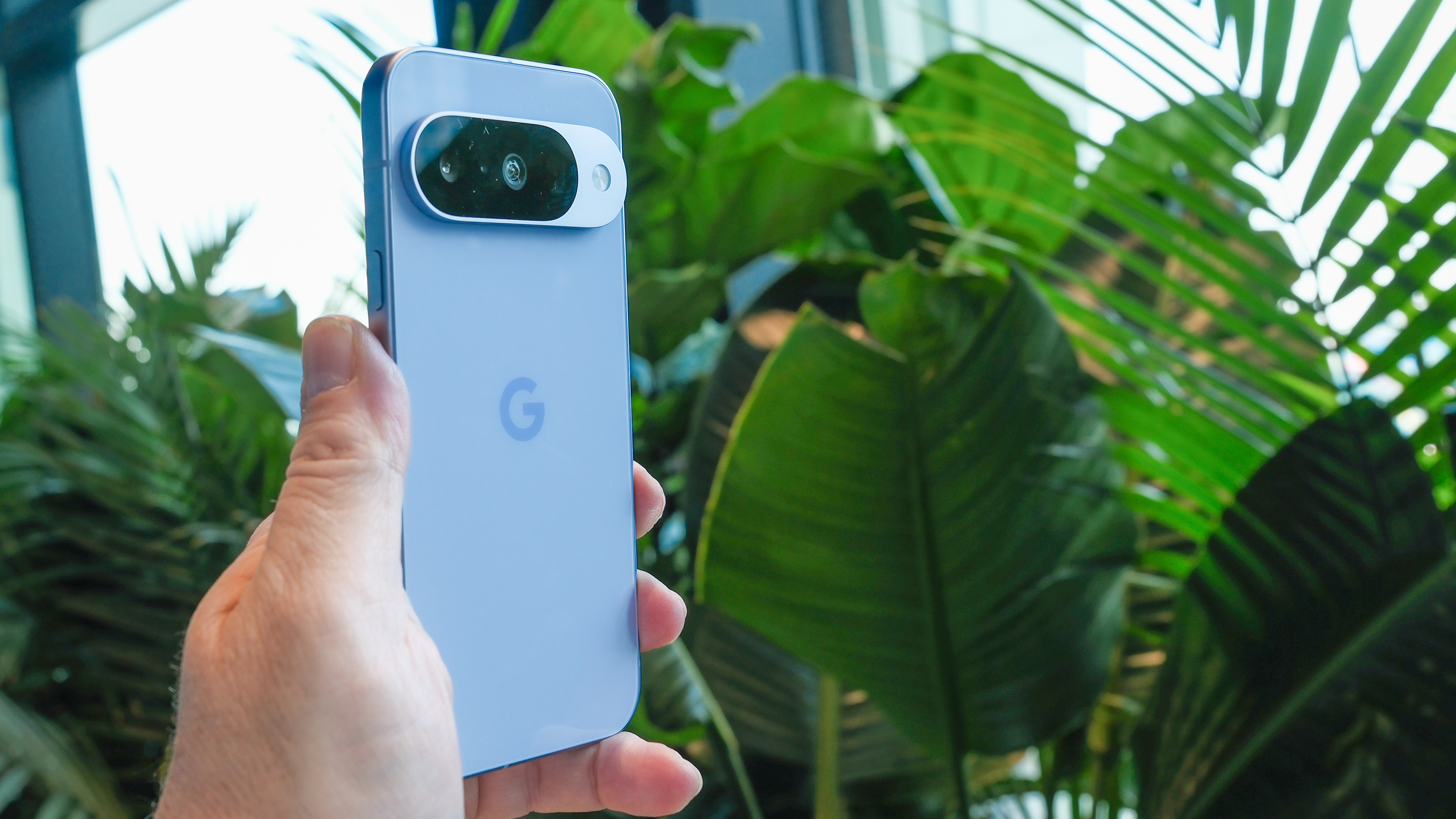 Google Pixel 10 in frost in hand