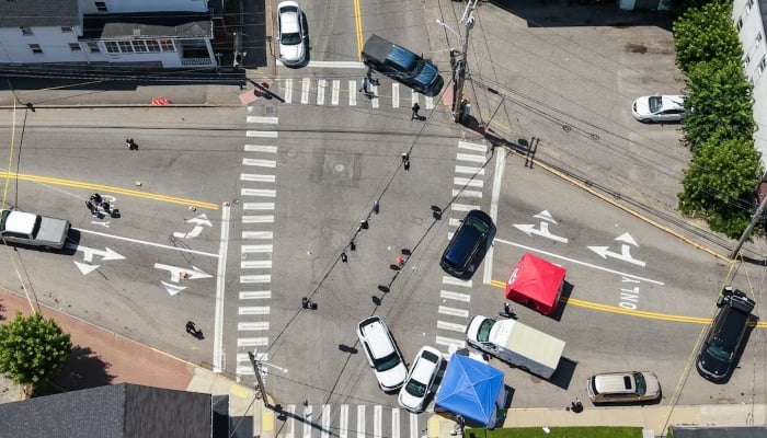 A drone image shows the cordoned off area at the scene of a shooting involving US Immigration and Customs Enforcement (ICE) in Biddeford, Maine, US, July 13, 2026. — Reuters