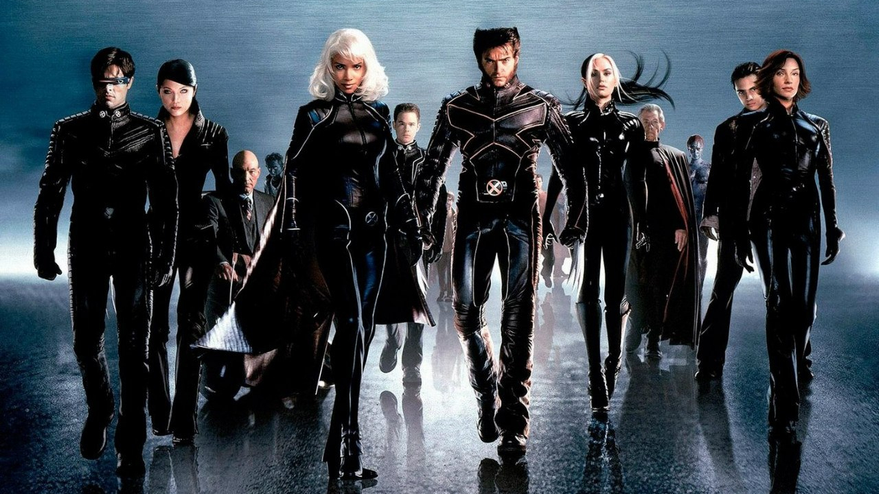 A press image showing the X-Men heading for the screen in their 2000 film
