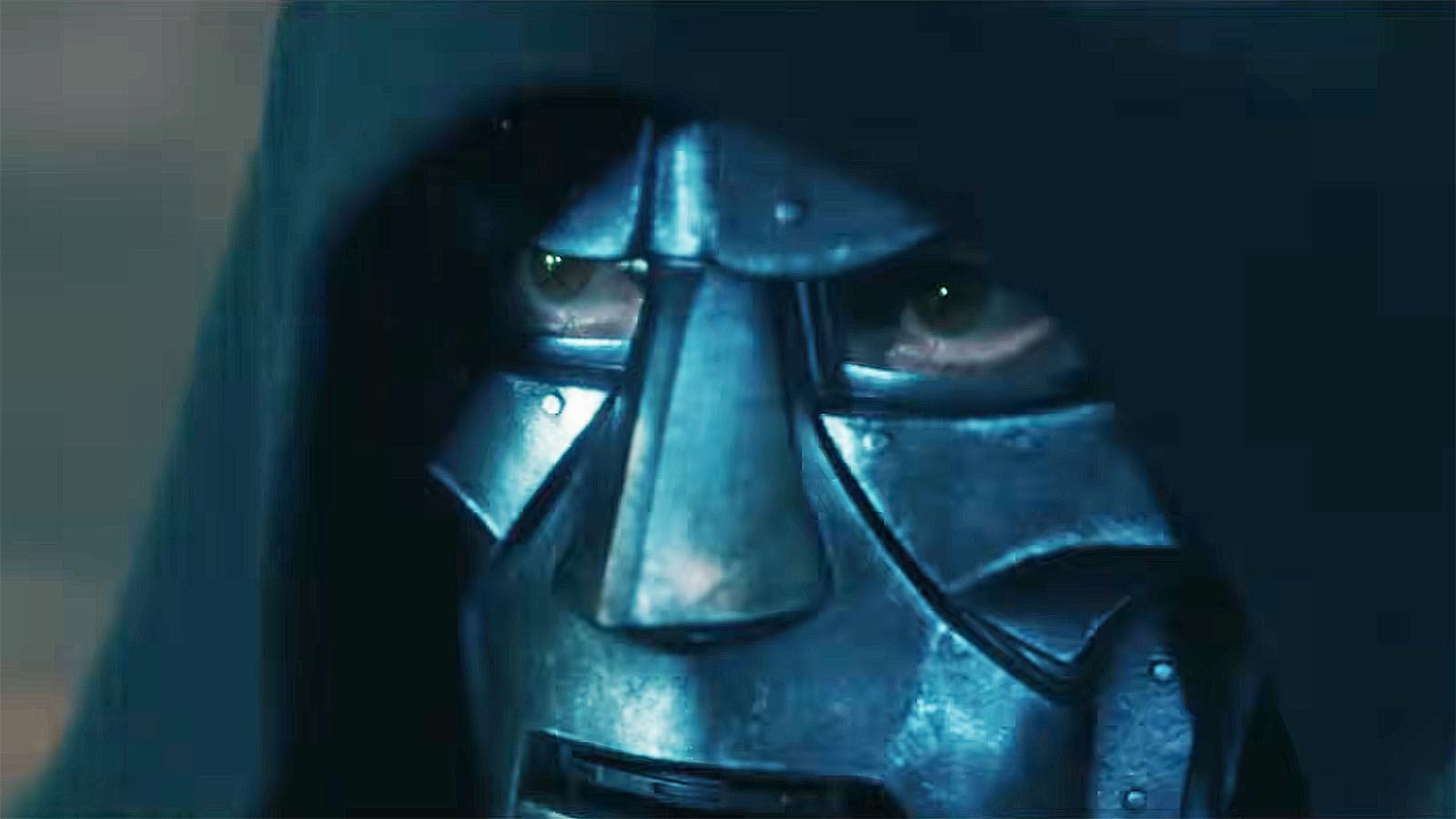 A close-up of Robert Downey Jr's Doctor Doom with his hood up and wearing his metal mask in Avengers: Doomsday