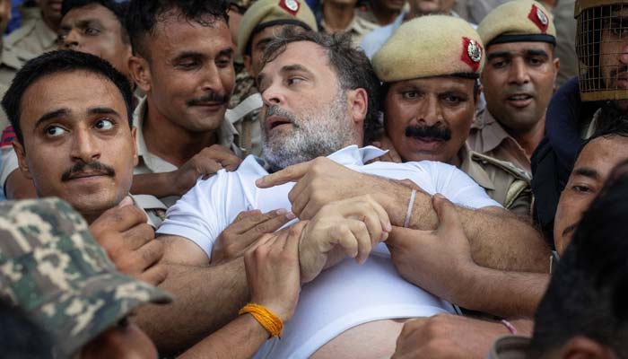 Indian opposition leader Rahul Gandhi is detained by police during a sit-in protest outside Prime Minister Narendra Modi's residence demanding accountability for police action against students, in New Delhi, India, July 21, 2026. — Reuters