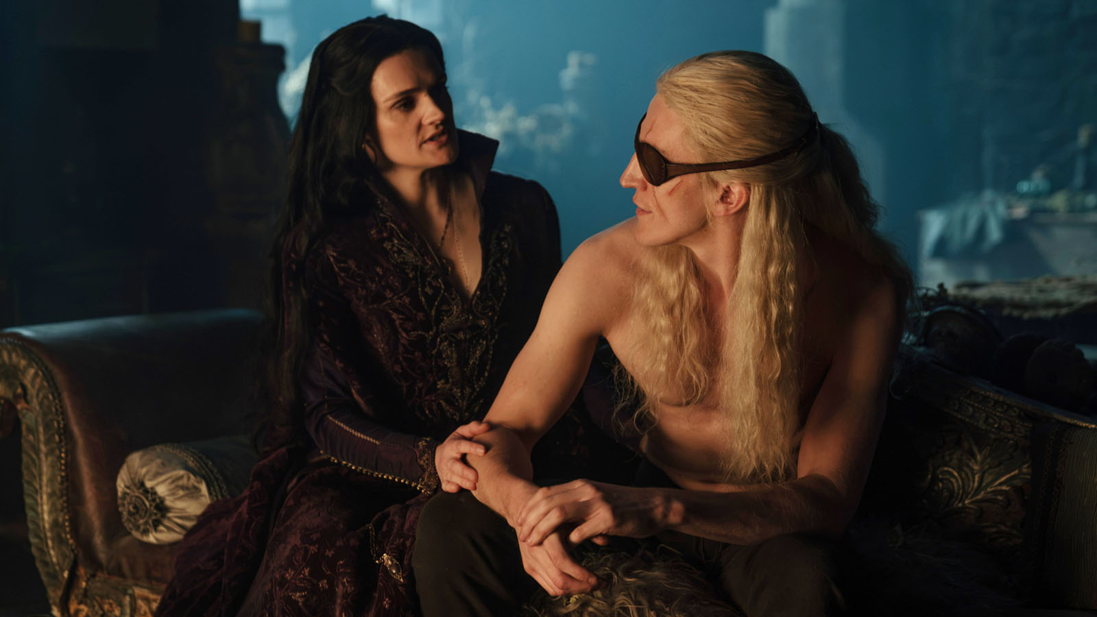 Alys and Aemond look at each other in a dark room lit by candlelight in House of the Dragon Season 3 Episode 6